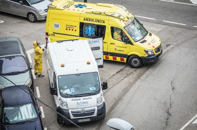 white and yellow van on road during daytime